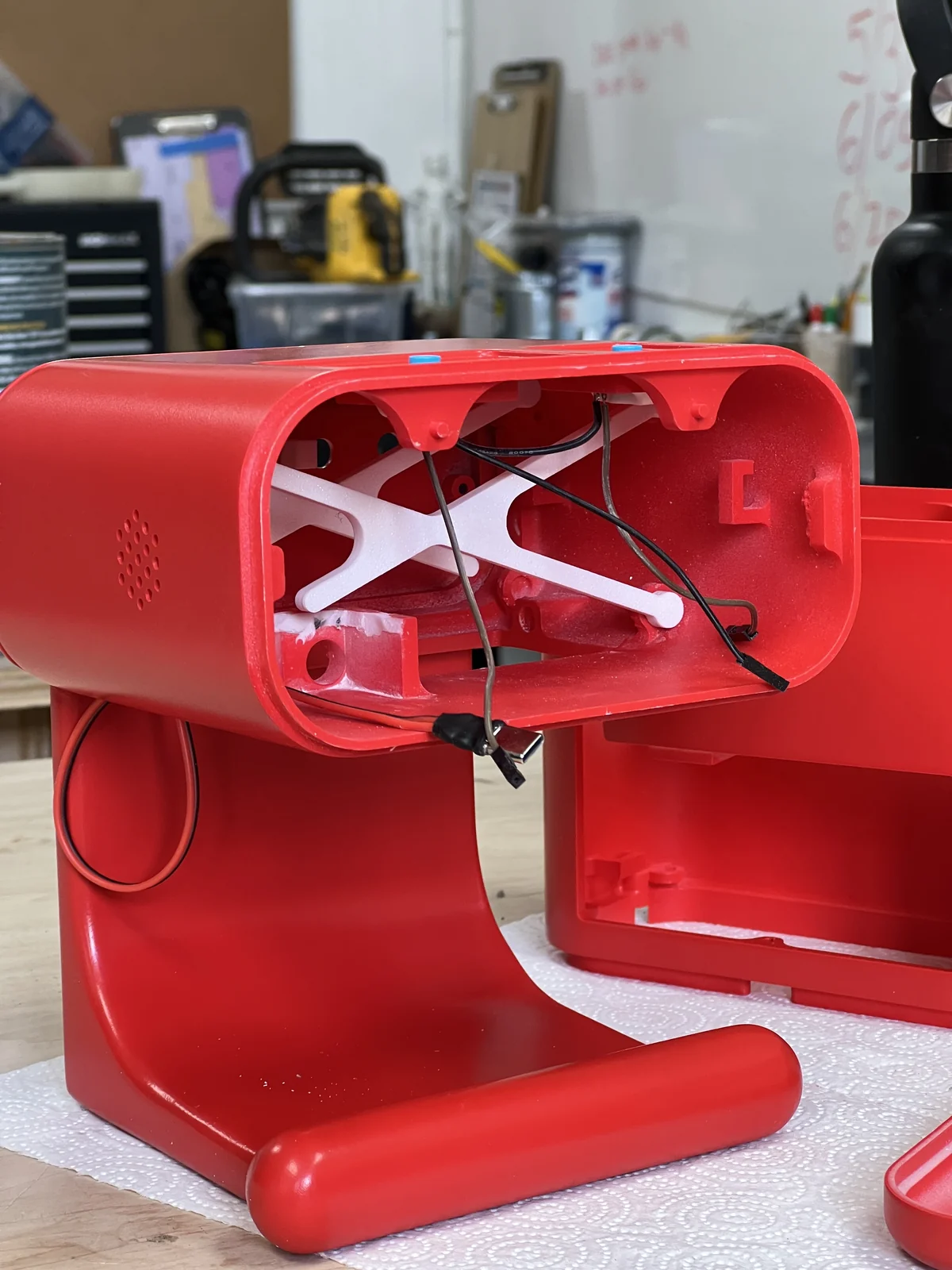 Open clock body showing wiring and internal parts