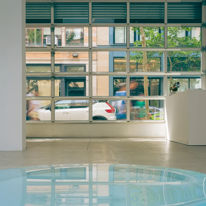 Buildings framed by a large window