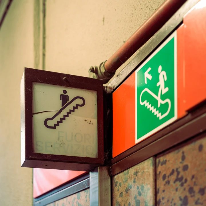 Escalator and exit signs